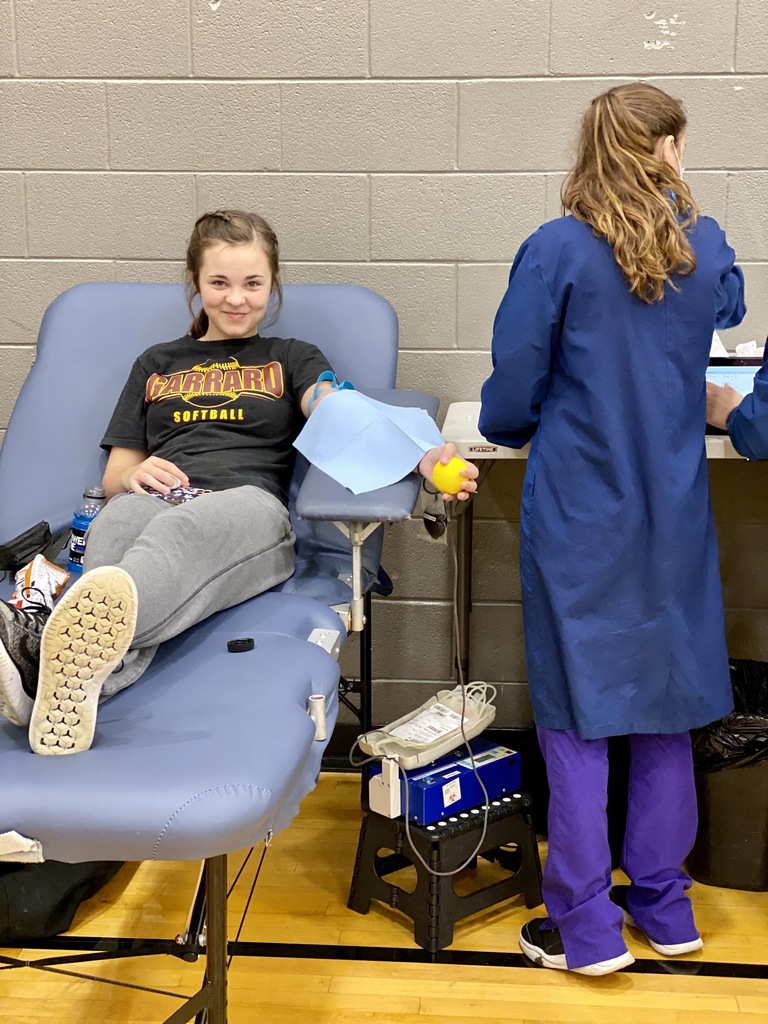Student Giving Blood at Blood Drive