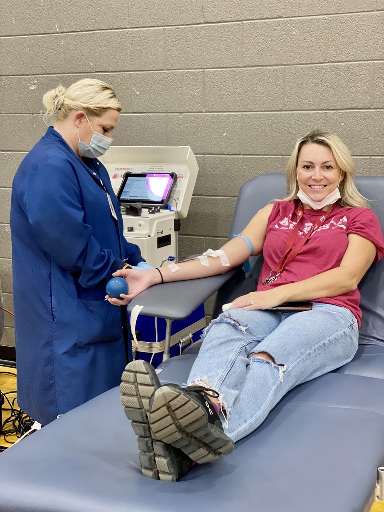 Staff Giving Blood at Blood Drive